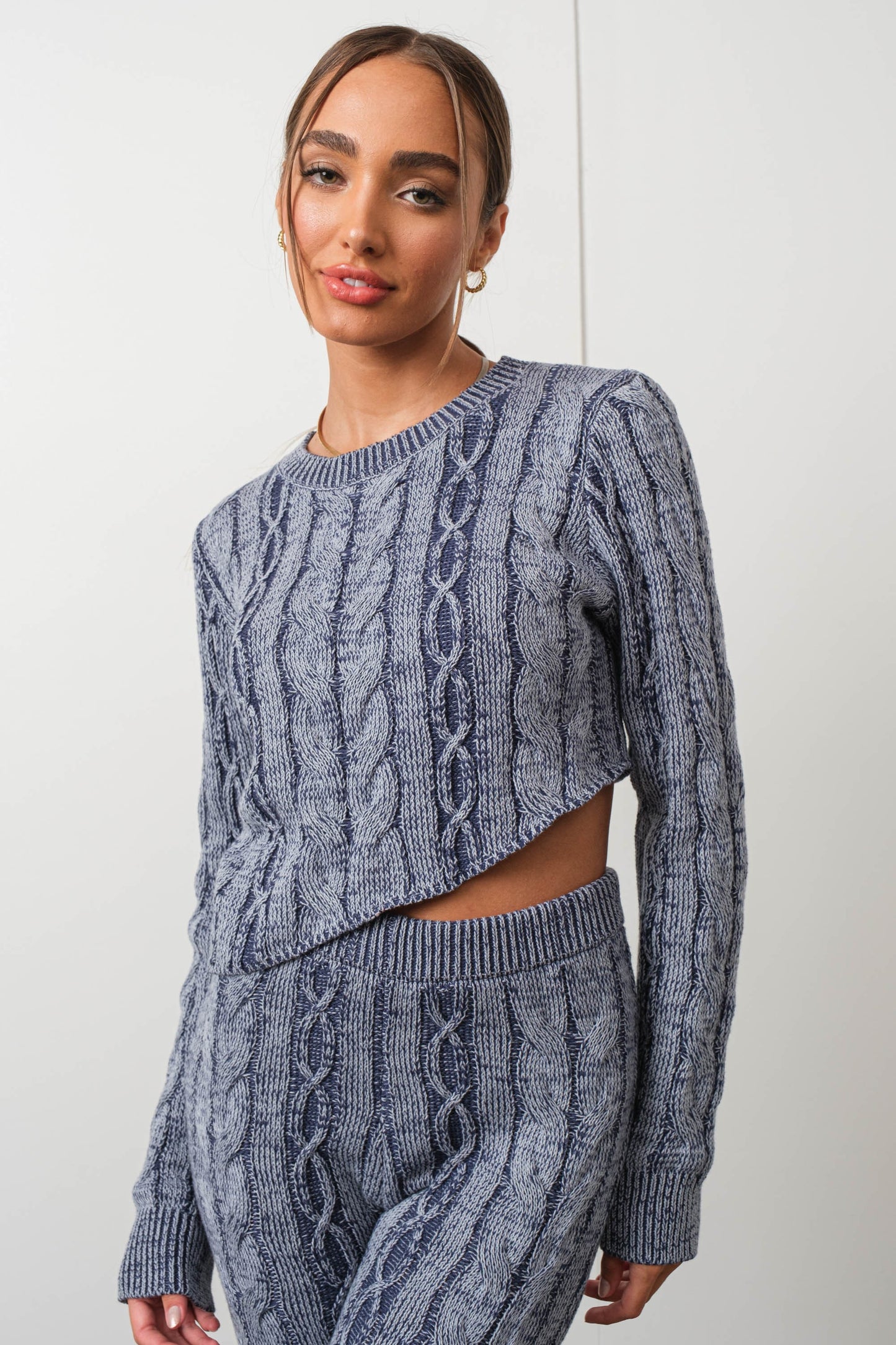ASYMMETRIC CABLE KNIT SWEATER
